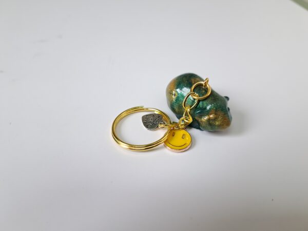 Sleutelhanger cavia turkoise/goud