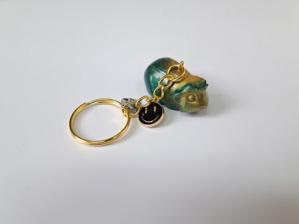 Sleutelhanger cavia turkoise/goud kruin