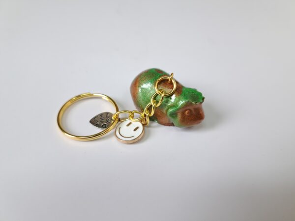 Sleutelhanger groen/brons kruin